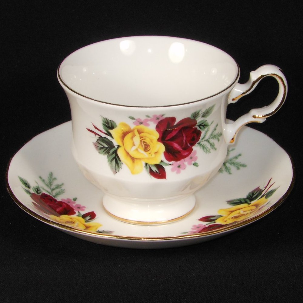 Tea cup & Saucer. Queen Anne UK fine bone china with gold rim
